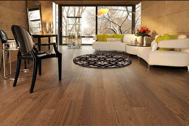 Inspiration for a mid-sized contemporary formal and enclosed medium tone wood floor living room remodel in San Francisco with gray walls and no tv