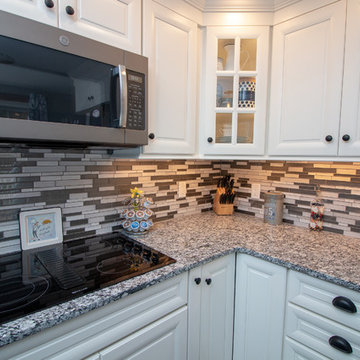 Traditional White Icing Kitchen remodel with click lock plank vinyl flooring
