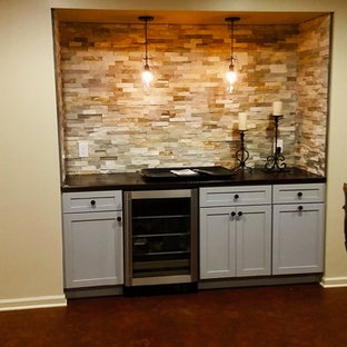 Design ideas for a large look-out basement in Cleveland with beige walls and cork flooring.