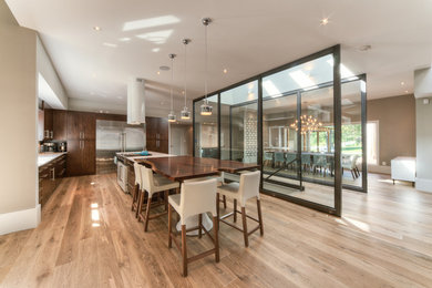 Photo of a contemporary kitchen in DC Metro with medium hardwood floors.