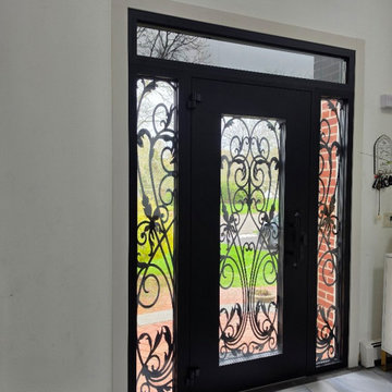 IRON 1601 with double wrought iron sidelites and transom