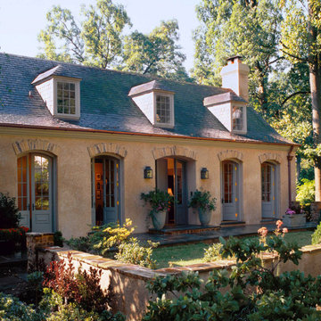Rustic French Country Home with Stucco and Stone