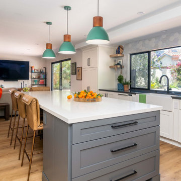 San Diego Kitchen Remodel with Oversized Quartz Island and Green Pendant Lights