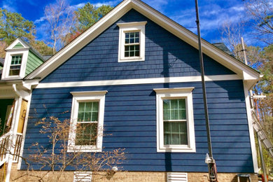 Transitional blue concrete fiberboard exterior home photo in Raleigh