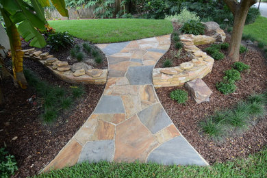 Natural Stone Dry-Stack Retaining Walls with Dry-Laid Stone Pathways