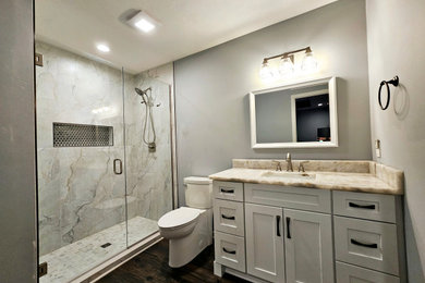 Bathroom - mid-sized contemporary master single-sink bathroom idea in Nashville with white cabinets, quartzite countertops and a built-in vanity