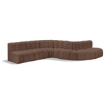 Meridian Furniture - Arc Vegan Leather Upholstered 7-Pc. S-Shaped Modular Sofa, Brown - Unleash modern opulence with the Arc Vegan Leather 7pc. Sectional. Crafted for the modern connoisseur, this Sectional injects an air of refined luxury into any space. Its sleek silhouette, upholstered in supple brown vegan leather, exudes timeless sophistication while the deep channel tufting adds textural intrigue, further elevating the chair's visual appeal. The modular design makes it a versatile chameleon, effortlessly adapting to your evolving needs and preferences. Whether you envision it gracing a chic living room corner, basking in the glow of a bedroom window, or adding a touch of drama to a home office, the Arc seamlessly complements your unique interior aesthetic.