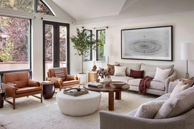 Mid-sized trendy formal and enclosed medium tone wood floor living room photo in Denver with white walls, no fireplace and no tv