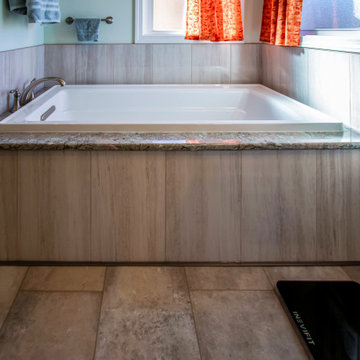 Primary Bathroom with Custom Corian and Tiled Shower, Tiled Tub Surround