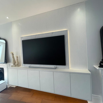 Floating TV unit with slatted panel