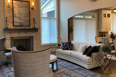 Example of a transitional living room design in Detroit