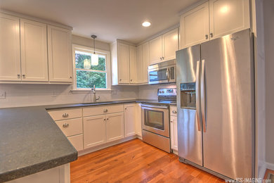 Kitchen - transitional kitchen idea in Other