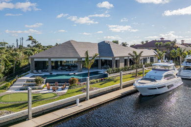 Example of a transitional garage design in Miami