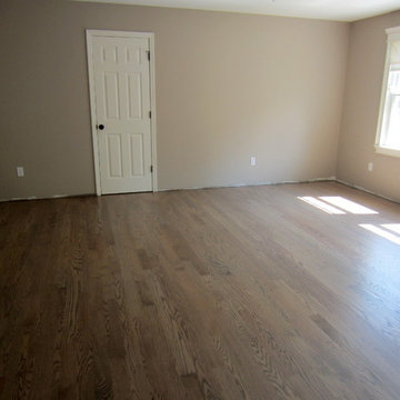 NISSEQUOGUE:  2 1/4" RED OAK W/ CUSTOM GREY BLEND STAIN + BONA TRAFFIC HD SATIN