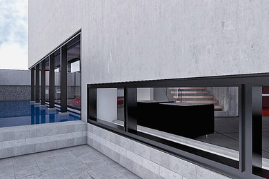 Mid-sized contemporary gray two-story concrete flat roof idea in Other