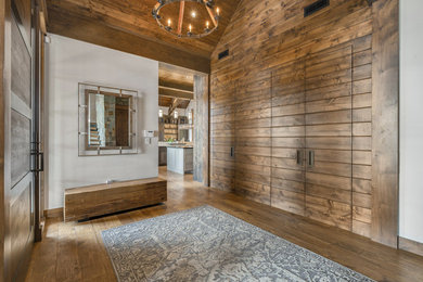 Mountain style home design photo in Other