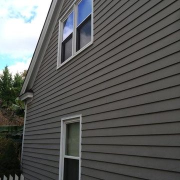 Charlotte, NC, upscale vinyl siding replacement by Belk Builders.