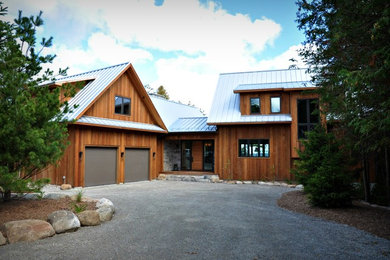 Rustic exterior home idea in Toronto