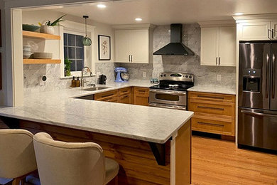Kitchen photo in Providence with recessed-panel cabinets