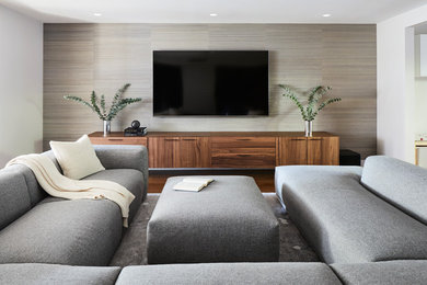 Inspiration for a large modern open concept family room in New York with beige walls, medium hardwood floors and brown floor.