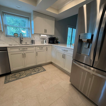 White Cabinets, Quartz Counters, Stunning Results