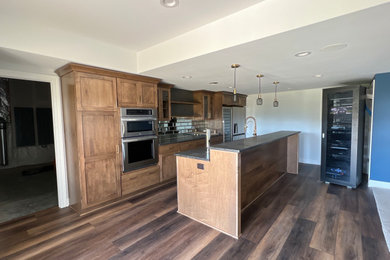 Mid-sized minimalist l-shaped kitchen photo in Chicago with shaker cabinets