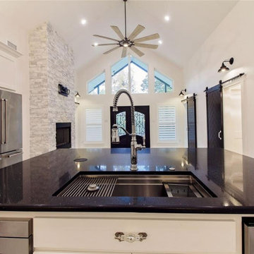 Full kitchen Remodeling with Black Countertop (Island view)