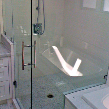 Medium-sized 90 Degree frameless shower with marble, Greater Vancouver
