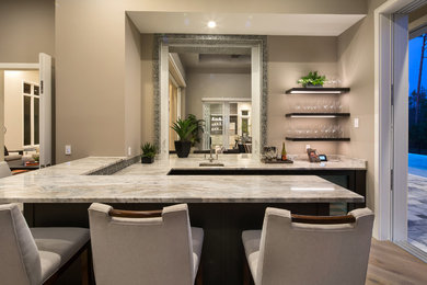 Inspiration for a transitional home bar remodel in Miami