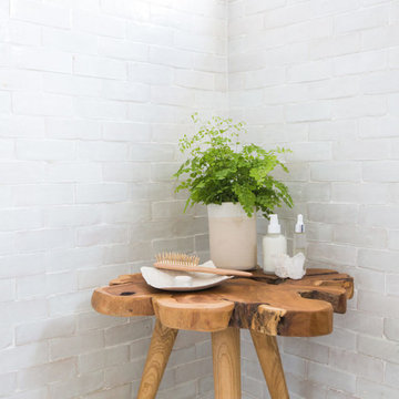 emily henderson's classic modern master bathroom with weathered white subway