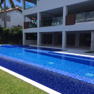 Modern pool with blue recycled glass tile