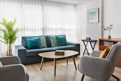 Example of a large minimalist open concept laminate floor and beige floor living room design in Alicante-Costa Blanca with white walls and no tv