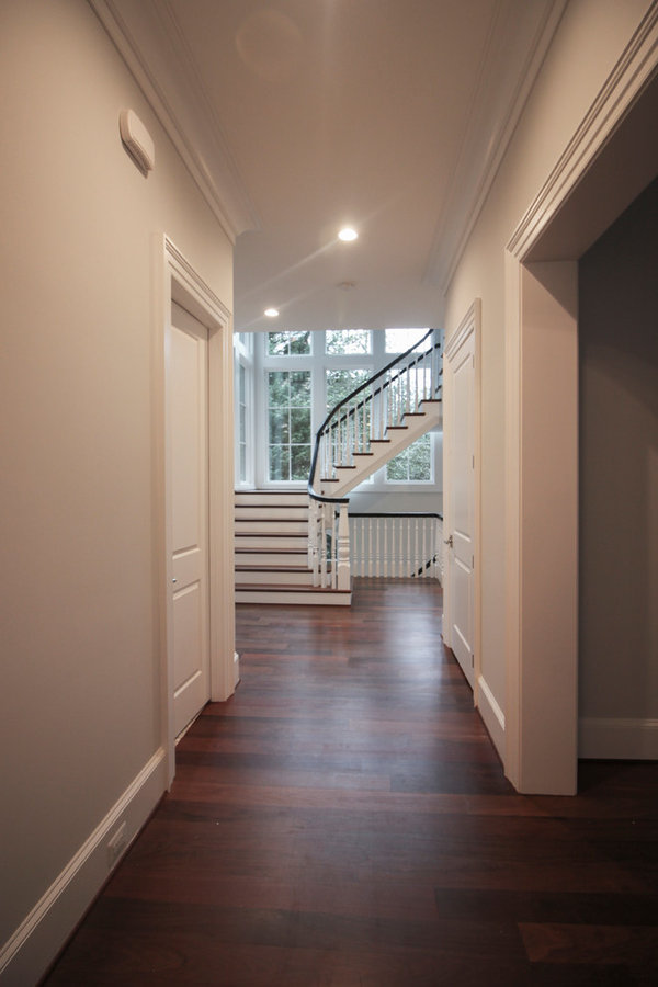 Powerful Impression by Floating Staircase in Suburban Foyer