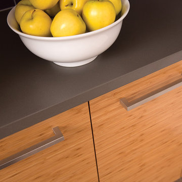 The Beauty of Bamboo - Close Up of Slab Bamboo Kitchen Cabinets with a Gray Coun