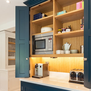 Traditional kitchen pantry designs - Example of a classic kitchen pantry design in Hertfordshire