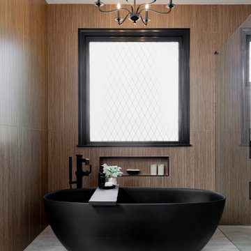 Modern Luxury Master Bathroom with Black Solid Surface Tub