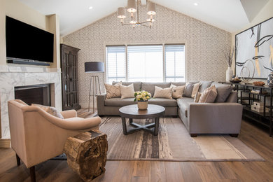 Mid-sized eclectic formal and open concept laminate floor and brown floor living room photo in San Francisco with beige walls, a corner fireplace, a tile fireplace and a wall-mounted tv