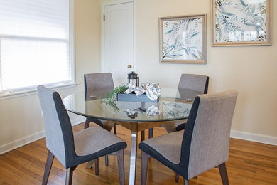 Small mid-century modern dining room photo in Other