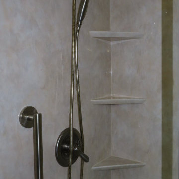 Travertine smooth wall shower close up
