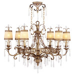 Livex Lighting - La Bella Chandelier, Hand-Painted Vintage Gold Leaf - A neoclassical influence is merged with the glamour of high fashion in this beautiful linear chandelier. The exquisite look features generous scrolls topped with a warm glow from the hand crafted gold dusted glass shades. K9 crystal accents further decorate the intricate frame which comes in a rich vintage gold leaf finish.