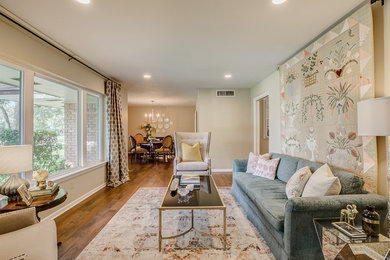 Living room - mid-sized transitional formal and open concept medium tone wood floor and brown floor living room idea in Dallas with beige walls, no fireplace and no tv