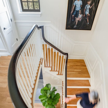 Transitional staircase with wainscoting