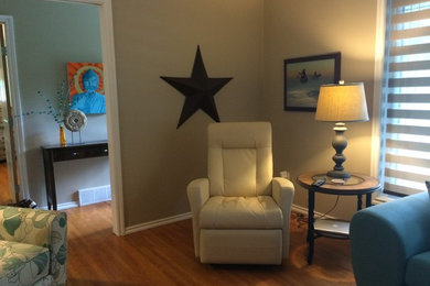 Example of a mid-sized transitional enclosed living room design in Other