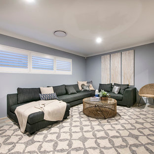 Large coastal enclosed home cinema in Perth with grey walls, vinyl flooring and a wall mounted tv.