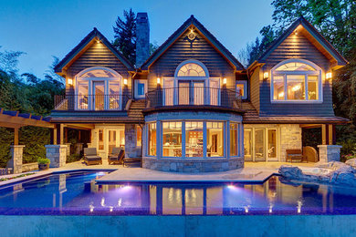 Mountain style pool photo in New York