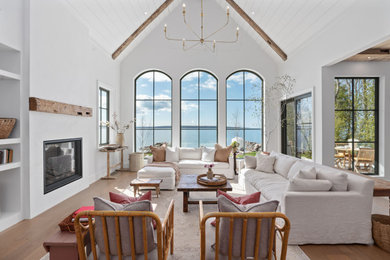 Example of a large french country living room design in Dallas