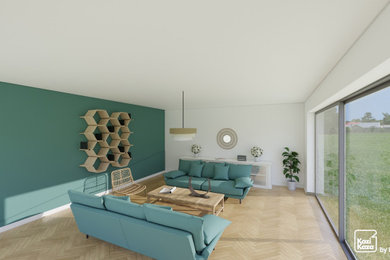 Idée de décoration pour un salon design avec un mur vert et sol en stratifié.