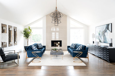 Example of a transitional formal and open concept medium tone wood floor living room design in Other with no tv