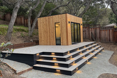Inspiration for a mid-sized modern shed remodel in Other