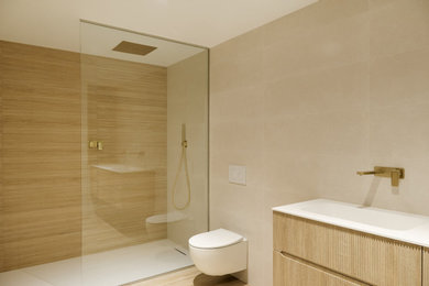 Inspiration for a medium sized modern family bathroom in London with beaded cabinets, white cabinets, a walk-in shower, a wall mounted toilet, beige tiles, porcelain tiles, beige walls, a built-in sink, quartz worktops, beige floors, an open shower, white worktops, a single sink and a floating vanity unit.